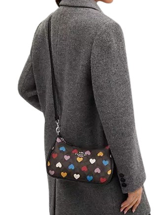 Explore the Coach Teri Shoulder Bag in Signature Canvas with Heart Print: A Trendy Choice for Every Occasion